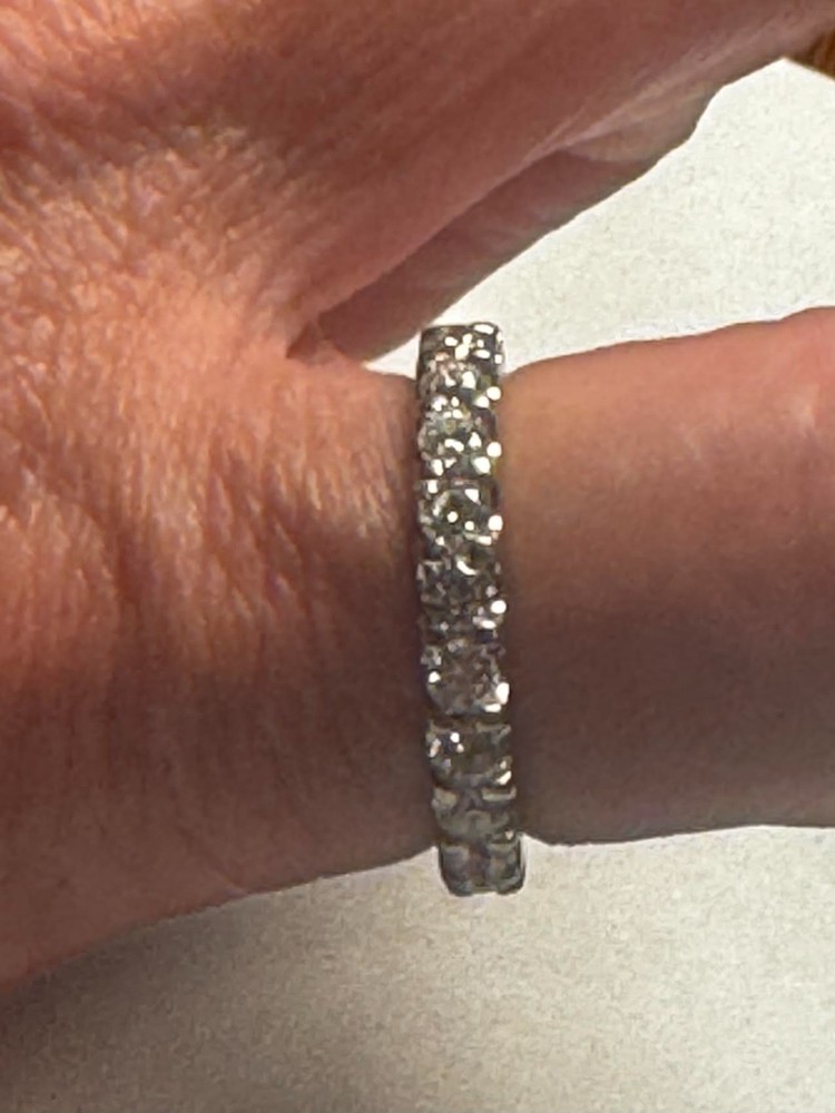 Size 8 earth mined diamond, platinum Eternity Band, purchased from Costco