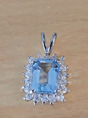 VINTAGE SKY BLUE TOPAZ EMERALD CUT STERLING SILVER 925 PENDANT W/ CZ ACCENTS