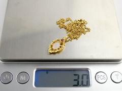 Vintage Goldtone Metal Ruby and Opaline Glass Pendant Necklace 3g 17.75 Inches