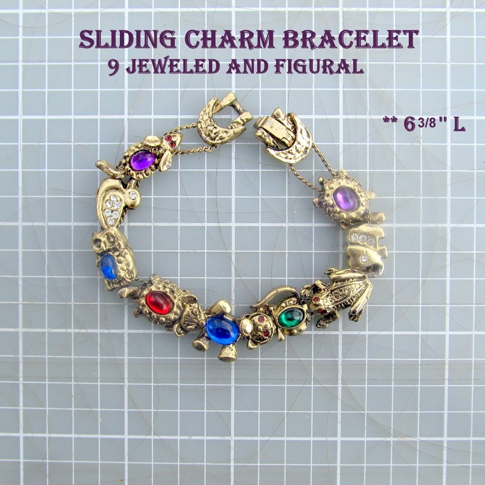 Vintage Sliding 9 Charm Bracelet 6 3/8”L Jeweled and Figural Unbranded