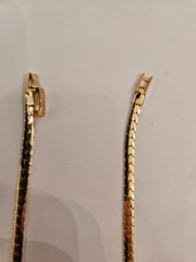 Gold tone necklace with black stone and cz’s.