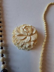 Vintage Carved Necklaces Earrings And Old Brooches.