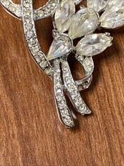 vintage rhinestone floral spray brooch, similar to designs from the 1940s-1950s