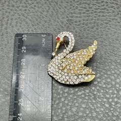 Vintage Swan Brooch Gold Tone Clear Rhinestone Bird Pin Red Eye Costume Jewelry