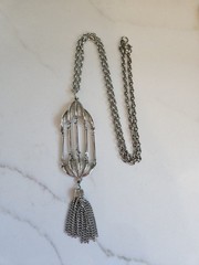 Vintage signed JJ JONETTE bird cage style tassel silver tone pendant necklace