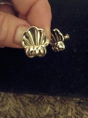 Women Silver Toned Shell Clip On Earrings