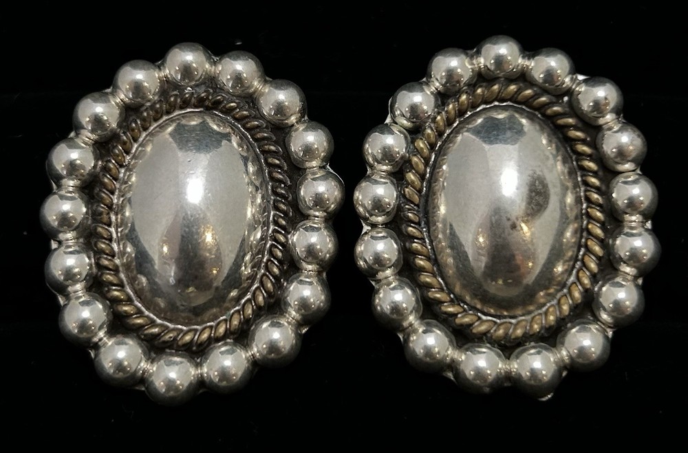 Pair of Silver Clip On Earrings