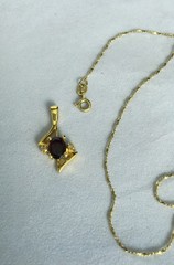 Garnet & diamond 24 KT pendant, & gold over sterling silver 17.75″ chain (#7959)