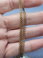 Vintage gold-toned chain with a faceted teardrop-shaped crystal pendant 32in +3.