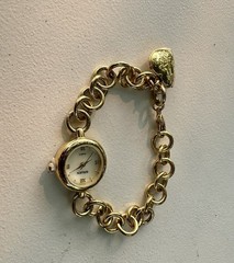 vintage Gruen Gold-Tone Charm Bracelet Watch.