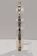 1995 Eliabeth Taylor Evening Star for Avon Gold & CZ Tennis Bracelet Book Piece