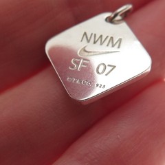 Tiffany & Co. Sterling Silver Vintage Nike Women’s Marathon 2007 Mini Pendant
