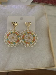 Handmade beaded earrings with post drop pierced.
