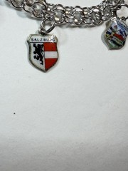 Vintage travel bracelet Sterling with charms popular between 1950 and 1970,