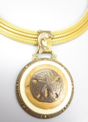 LOVELY PATRICE BRASS RESIN &  SHELL SAND DOLLAR DOLPHIN STATEMENT NECKLAC
