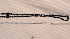 Neiger Brothers art deco black Egyptian Revival flapper knotted necklace