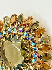 Vintage Unsigned Brown, Gray, and Aurora Borealis Round Brooch