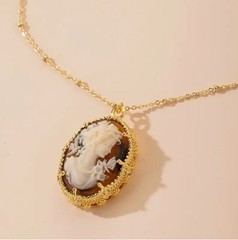 Amber Cameo Pendant Necklace on 16-18″ Gold Tone Chain