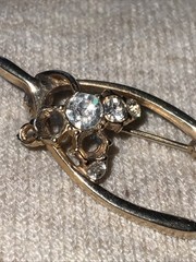 Gold Tone Wishbone Vintage Brooch With Clear Rhinestones ** Missing Stones