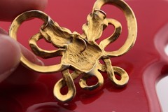 Vintage 1982 Metropolitan Museum of Art Braided Gold Tone Bow Pendant MMA