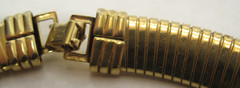 AVON 1886-1986 Gold Tone Omega Rhinestone Choker Necklace 100th Anniversary VTG