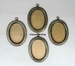 #1412 ANTIQUED GOLD ART DECO 25×18 BEZEL W/TOP HANG RING – 4 Pc Lot