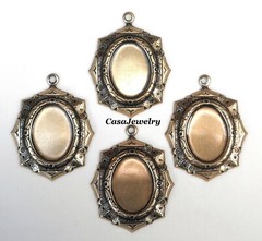 #1595 ANTIQUED GOLD 18X13 OCTAGON BEZEL W/TOP HANG RING – 4 Pc Lot