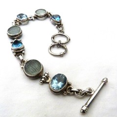 LARGE OVAL FACETED BLUE TOPAZ MELON CARVED QUARTZ STERLING SILVER BRACELET