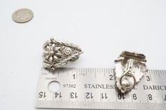 Vintage Clip On Earrings Silver Tone Textured Flower