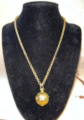Filigree Aromatherapy Diffuser Necklace.