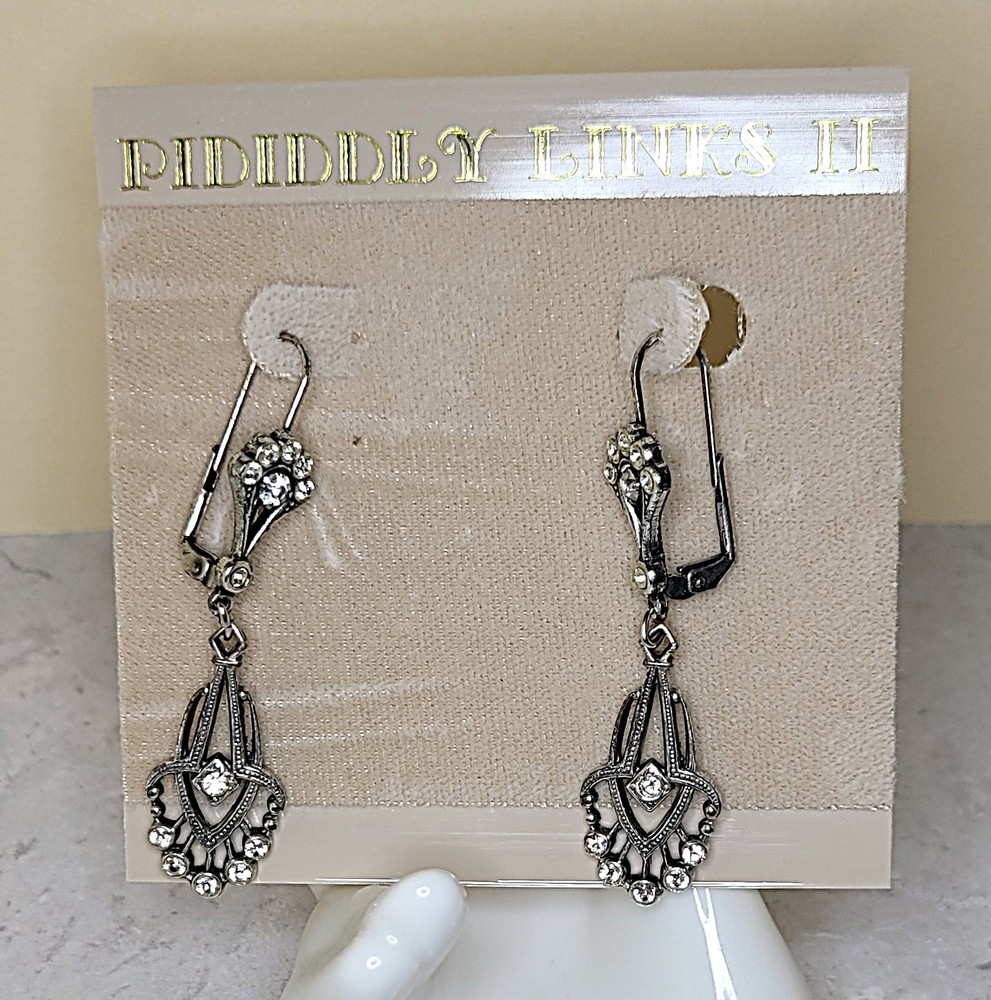 Piddidly Links II antique silver-tone chandelier earrings with rhinestones.