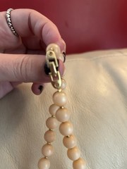 1980s Napier Pale Orange and Cream Lucite with Gold spacers Necklace.