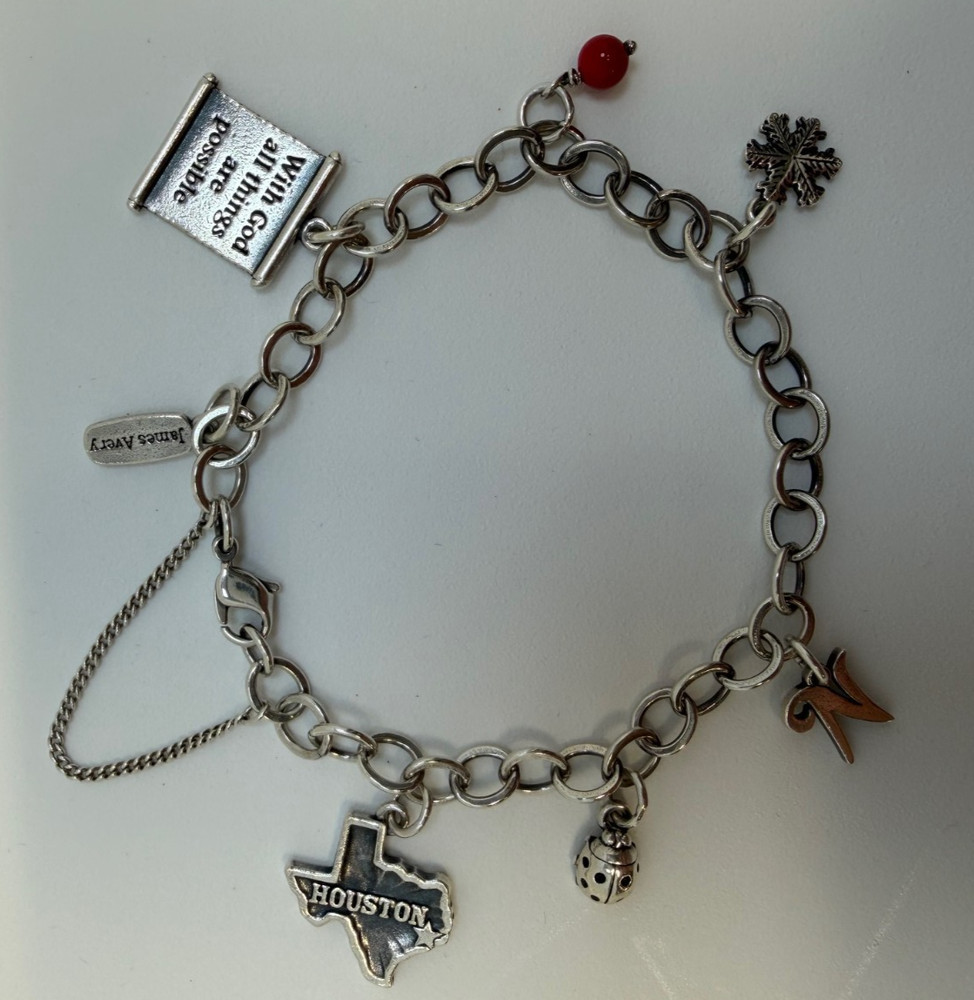 James Avery Sterling silver Charm bracelet with 6 Charms 7.5 Inch. 18+ Grams.