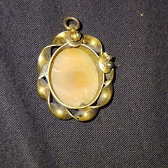 Antique Shell Cameo Style Pendant, Gold-Tone Twisted Frame Translucent