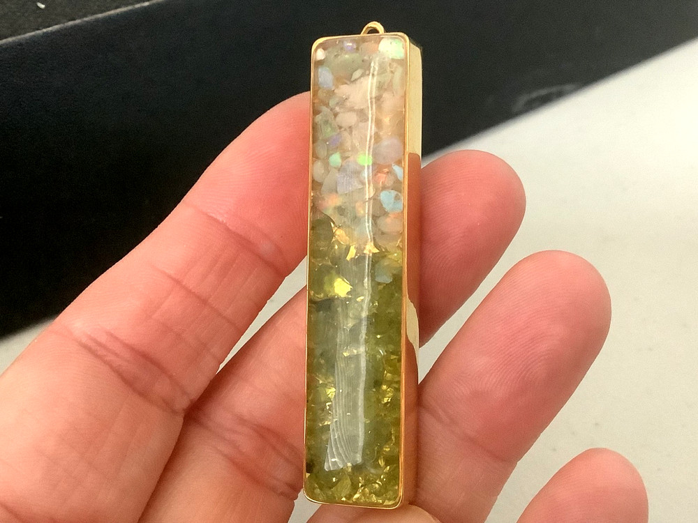 Vintage gold plated genuine Opal Peridot nuggets in resin bar pendant 0.5” x 2”