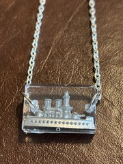 Vintage, Metal Ship Game Piece, Suspended in Resin, on a Silver Plated Chain.WOW