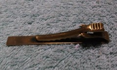 Vintage Brass Tone ADVENTURE AC GM Tie Clip