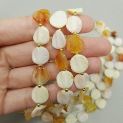 Vintage Long Single Strand Orange and Cream Beaded Necklace Plastic Leaf Shapes