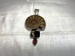 A Charles Albert, signed Ammonite, Smokey Topaz, Garnet Pendant, Fine Sterling