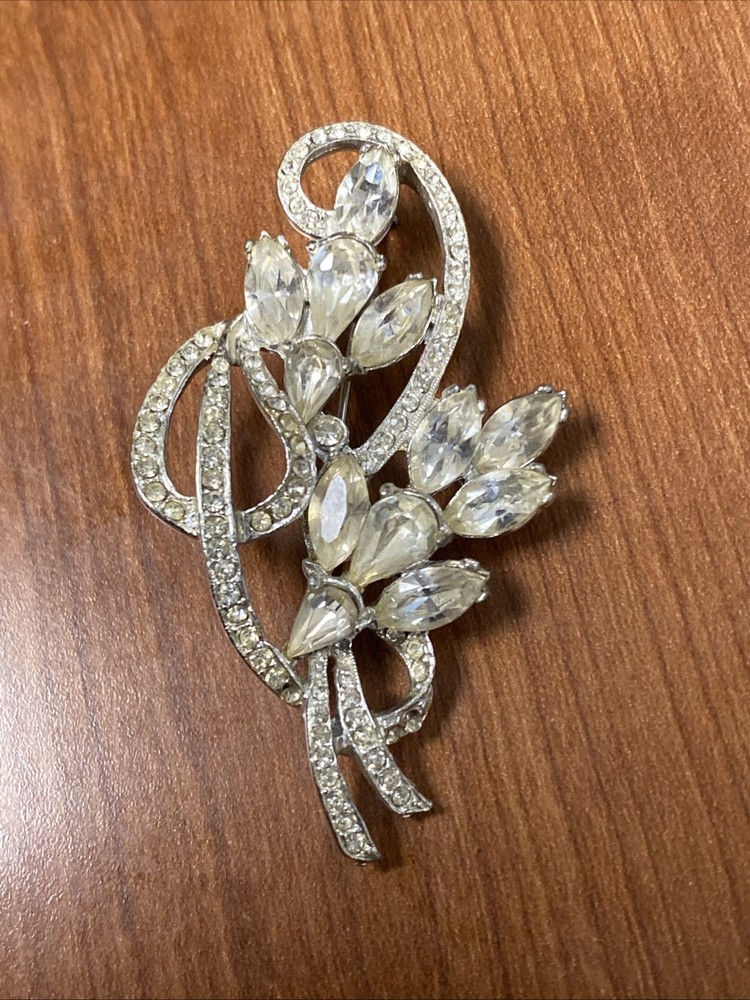 vintage rhinestone floral spray brooch, similar to designs from the 1940s-1950s