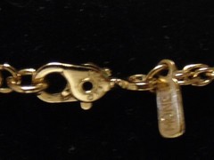 MONET Enchanting Gold Tone Unbloomed Flower (Bullet Shape) Pendant Necklace