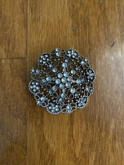 Round Silver Tone Base Metal Brooch With Clear Rhinestones 1 3/4 Inches