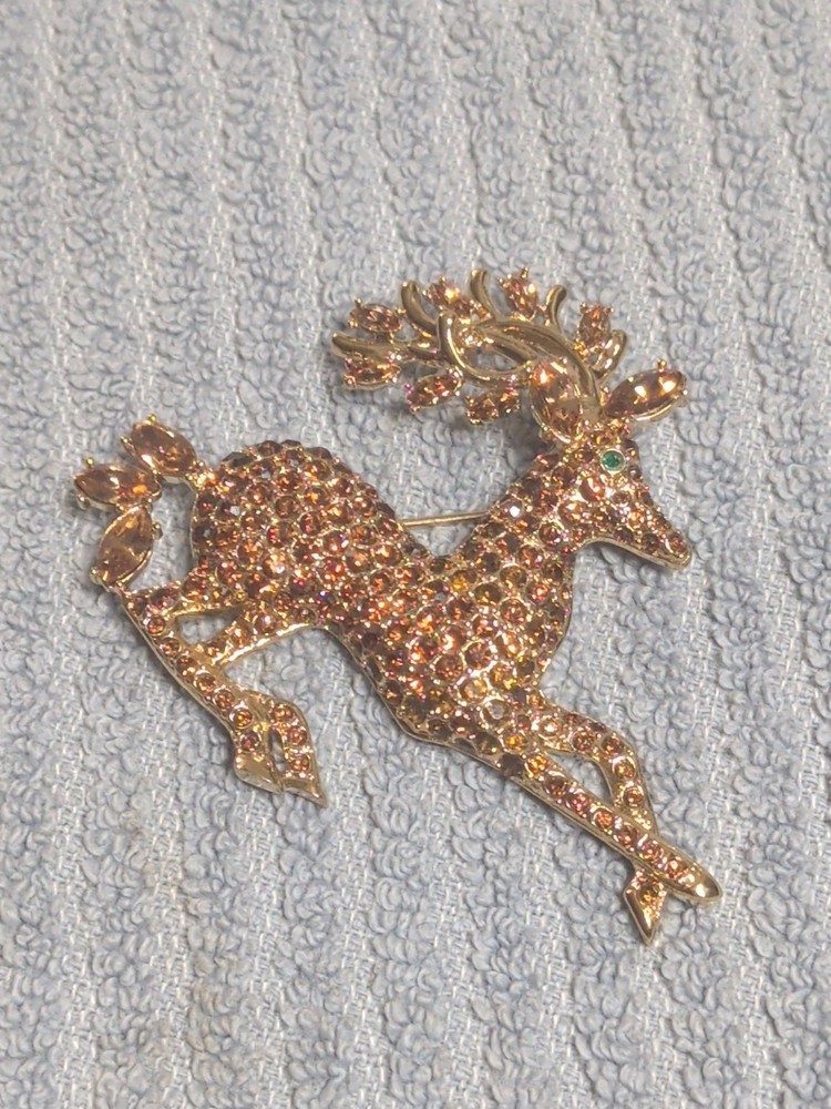 Nolan Miller Christmas Gold Tone Reindeer Brooch with Rhinestones