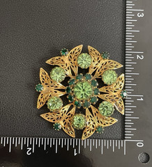 Vintage Celebrity Rhinestone Brooch Green Gold Tone Signed NY “GLOWS”