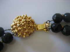 VINTAGE SIGNED MARVELLA BLACK FACETED BEAD WITH FANCY GOLD TONE CLASP NECKLACE