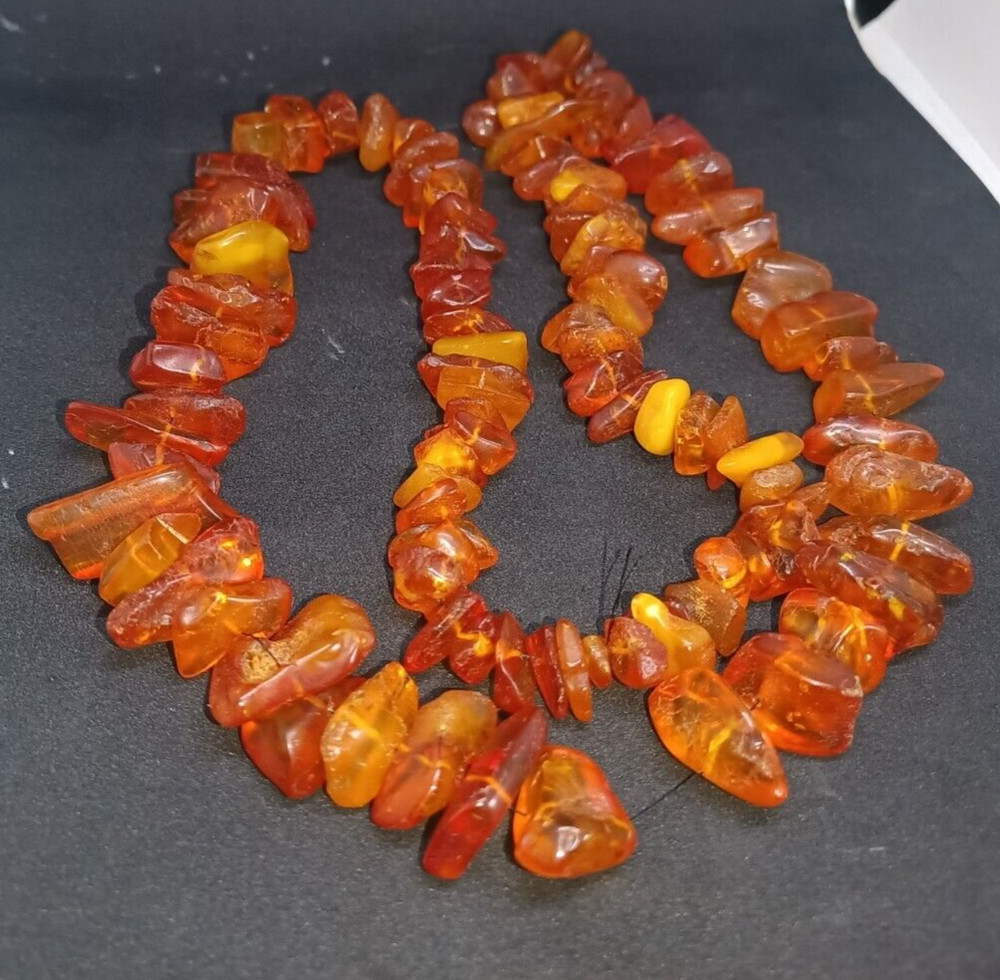 Necklace made of natural beautiful cognac amber weight 74 grams.