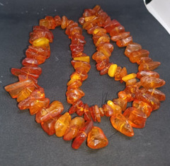 Necklace made of natural beautiful cognac amber weight 74 grams.