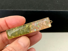 Vintage gold plated genuine Opal Peridot nuggets in resin bar pendant 0.5” x 2”