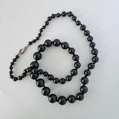 36″ Long Graduated Black Individually Knotted Bead Necklace