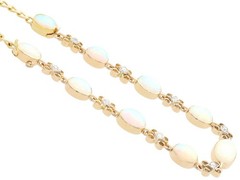 9.50Ct White Opal and 0.24Ct Diamond 15k Yellow Gold Necklace / Bracelet Set